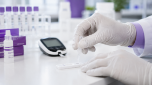 Healthcare Operations & Practice Management Blog | Integral Clinic Solutions 5 A close-up photograph of a medical clinician in a brightly lit clinic laboratory setting up an FDA-waived point-of-care diagnostic test kit for a practice utilizing a CLIA Certificate of Waiver, next to softly blurred medical equipment.